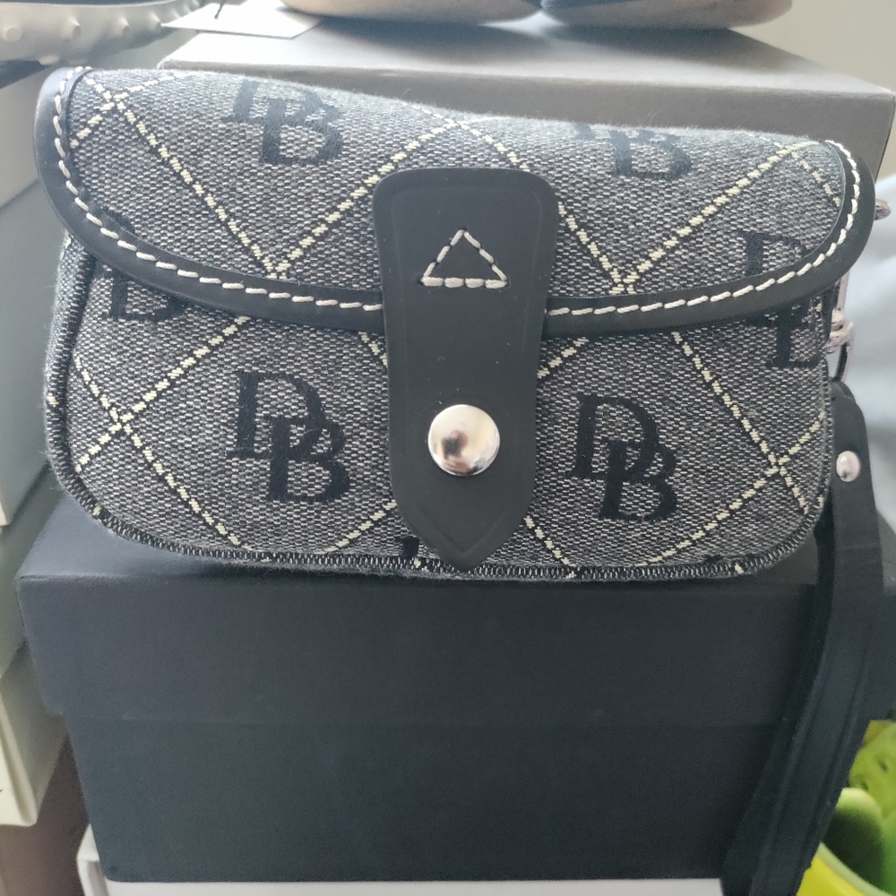 Authentic Dooney & Bourke Flap Wristlet